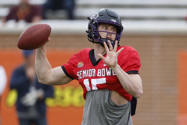 American quarterback Max Duggan of TCU throws a pass during practice for the Senior Bowl NCAA college football game, Thursday, Feb. 2, 2023, in Mobile, Ala.. (AP Photo/Butch Dill)