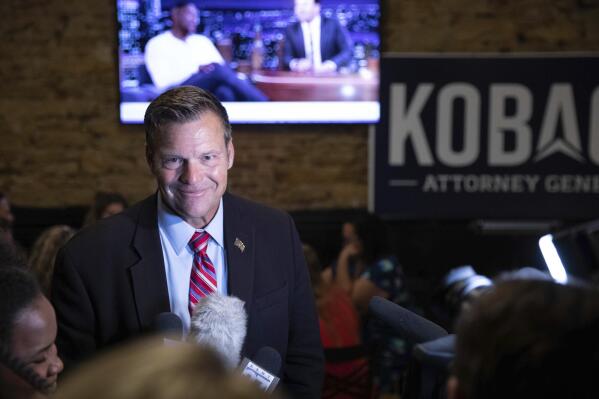 Kansas Attorney General candidate Kris Kobach delivers his final remarks as the results come in during his watch party at the Celtic Fox Irish Pub and Restaurant in Topeka, Kan., late Tuesday, Aug. 2, 2022. (Chance Parker/The Topeka Capital-Journal via AP)