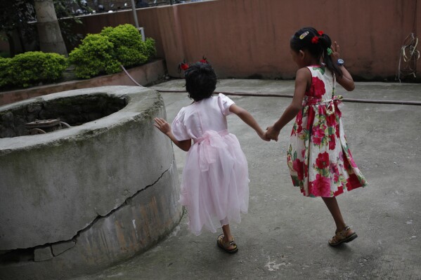 Khendo Tamang, right, Nirmala Pariyar will perform in the courtyard of BIR Hospital, Kathmandu, Nepal, August 19, 2015 (AP Photo/Niranjan Shrestha)