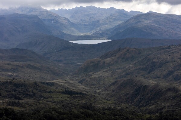 Mountains surround the Chingaza lagoon in the paramo of Chingaza National Natural Park, Colombia, March 19, 2024, the primary water source for millions of residents in the capital city of Bogota. (AP Photo/Ivan Valencia)