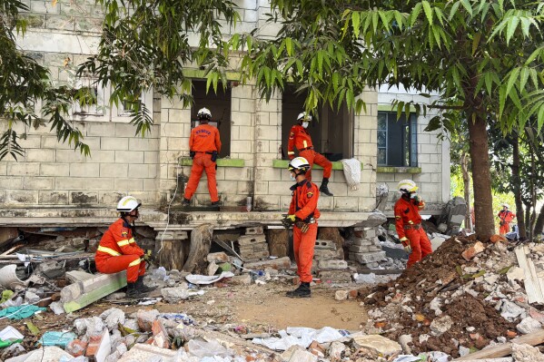 Burmese rescuers work through the rubble of a collapsed building following Friday's earthquake in Naypyitaw, Myanmar, Thursday, April 3, 2025. (AP Photo)