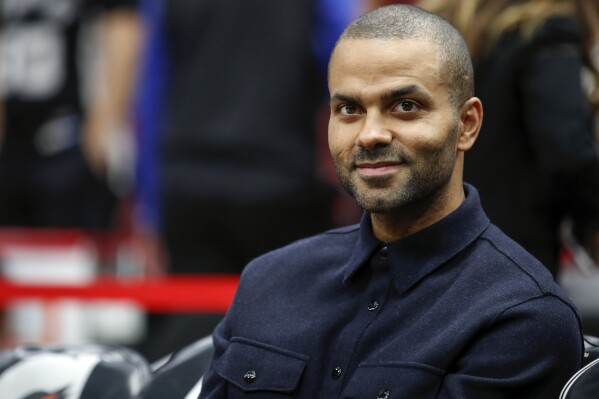 FILE - San Antonio Spurs guard Tony Parker smiles before an NBA basketball game against the Chicago Bulls, Oct. 21, 2017, in Chicago. The four-time NBA champion told The Associated Press on Friday, June 23, 2023, he sees a bright future at his former team for fellow Frenchman Victor Wembanyama. (AP Photo/Kamil Krzaczynski, File)