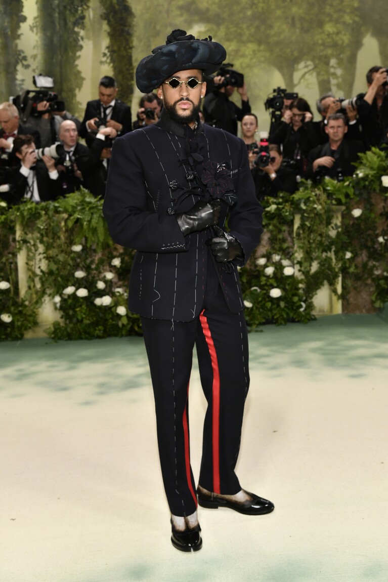 Bad Bunny attends a benefit gala for the Costume Institute of the Metropolitan Museum of Art to celebrate the opening "Sleeping Beauty: Awakening Fashion" Exhibition on Monday, May 6, 2024 in New York.  (Photo by Evan Agostini/Invision/AP)