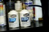 Cans of R-134A refrigerant sit on the shelves of Cary's Auto, Monday, Aug. 28, 2023, in Scottsdale, Ariz. Refrigerants absorb a lot more heat than water or other common fluids, which makes them great for cooling systems, but bad for climate change when they escape. (AP Photo/Matt York)