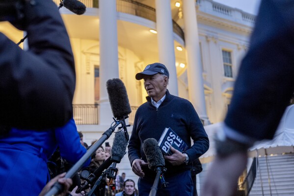 President Joe Biden speaks to members of the media before boarding Marine One on the South Lawn of the White House in Washington, Friday, March 1, 2024. (AP Photo/Andrew Harnik)