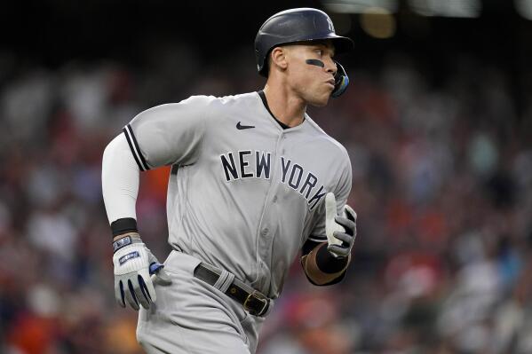 New York Yankees Aaron Judge (99) watches his ball fly out during the first inning in Game 2 of baseball's American League Championship Series between the Houston Astros and the New York Yankees, Thursday, Oct. 20, 2022, in Houston. (AP Photo/Eric Gay)