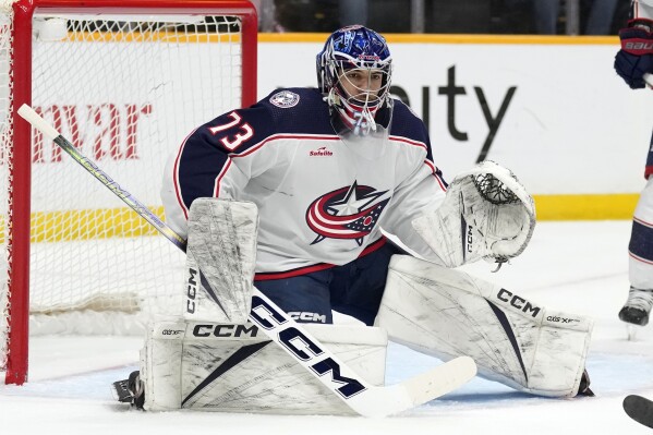 FILE - Columbus Blue Jackets goaltender Jet Greaves (73) plays against the Nashville Predators during the second period of an NHL hockey game Saturday, April 13, 2024, in Nashville, Tenn. The Blue Jackets signed the 23-year-old goalie to a new two-year contract. (ĢӰԺ Photo/Mark Humphrey, File)