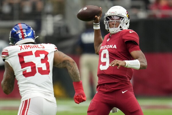 Arizona Cardinals quarterback Joshua Dobbs (9) throws against the New York Giants during the first half of an NFL football game, Sunday, Sept. 17, 2023, in Glendale, Ariz. (AP Photo/Ross D. Franklin)