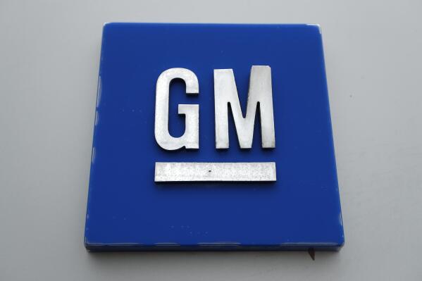 FILE - This Jan. 27, 2020 file photo shows a General Motors logo at the General Motors Detroit-Hamtramck Assembly plant in Hamtramck, Mich. General Motors says it’s building a huge new electric vehicle battery lab in Michigan. There scientists will work on chemistry to cut costs 60% over current vehicles and allow people to travel 500 to 600 miles per charge. Structural steel already is in place for the 300,000-square-foot lab on the grounds of GM’s Technical Center in the Detroit suburb of Warren. (AP Photo/Paul Sancya, File)
