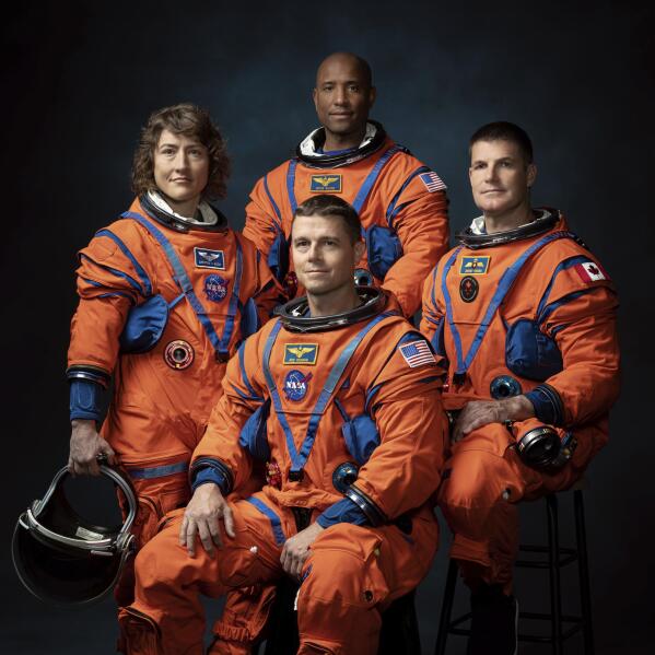 This photo provided by NASA shows, from left, NASA Astronauts Christina Koch, Victor Glover, Reid Wiseman, and Canadian Space Agency Astronaut Jeremy Hansen at the Johnson Space Center in Houston on March 29, 2023. On Monday, April 3, 2023, NASA announced them as the crew who will be the first to fly the Orion capsule, launching atop a Space Launch System rocket from Kennedy Space Center no earlier than late 2024. They will not land or even go into lunar orbit, but rather fly around the moon and head straight back to Earth, a prelude to a lunar landing by two others a year later. (Josh Valcarcel/NASA via AP)