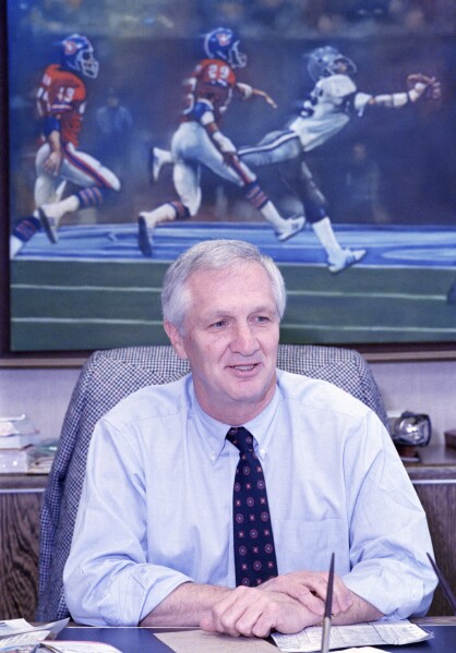 FILE - Gil Brandt, college player scout for the Dallas Cowboys, talks to the media from his office in Irving, Texas, May 2, 1989, after being fired by new Cowboys owner Jerry Jones. Gil Brandt, overshadowed by coach Tom Landry and general manager Tex Schramm as part of the trio that built the Dallas Cowboys into “America’s Team” in the 1970s, has died. He was 91. The Pro Football Hall of Fame said Brandt died Thursday morning, Aug. 31, 2023. (AP Photo/Ron Heflin)