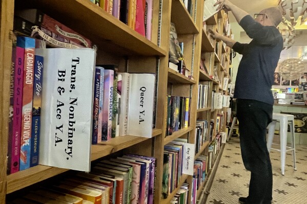 An LGBTQ+ related book is seen on shelf at Fabulosa Books a store in the Castro District of San Francisco on Thursday, June 27, 2024. (AP Photo/Haven Daley,File)