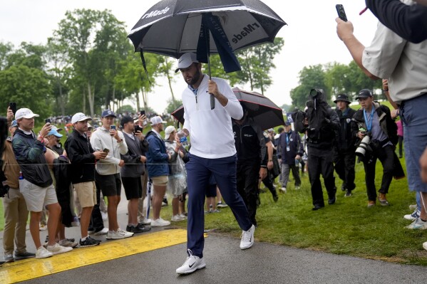 Scottie Scheffler walks to the tee on the 11th hole during the second round of the PGA Championship golf tournament at the Valhalla Golf Club, Friday, May 17, 2024, in Louisville, Ky. (AP Photo/Jeff Roberson)