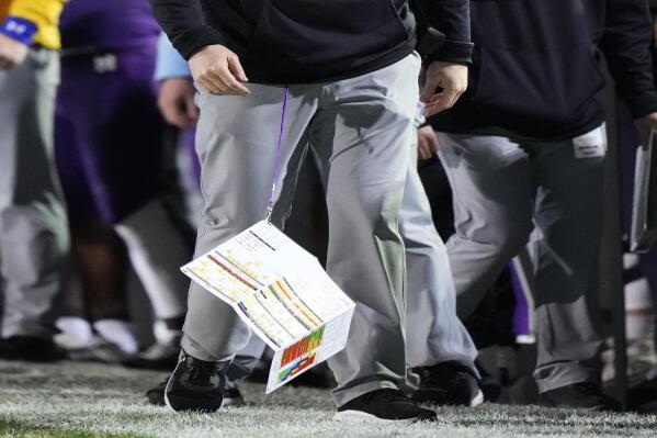 Northwestern head coach Pat Fitzgerald reacts as he looks down on the sideline during the second half of an NCAA college football game against Illinois in Evanston, Ill., Saturday, Nov. 26, 2022. Illinois won 41-3. (AP Photo/Nam Y. Huh)