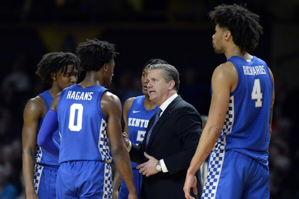 FILE - Kentucky head coach John Calipari talks to his players during the second half of an NCAA college basketball game against Vanderbil, Feb. 11, 2020, in Nashville, Tenn. Calipari will receive the John R. Wooden Award Legends of Coaching award, according to an announcement by Wooden's grandson, Greg Wooden, Tuesday, Oct. 3, 2023. (AP Photo/Mark Zaleski, File)
