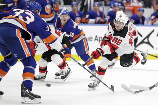 New York Islanders defenseman Zdeno Chara (33) skates against the New Jersey  Devils in the second period of an NHL hockey game Thursday, Jan. 13, 2022,  in Elmont, N.Y. (AP Photo/Adam Hunger