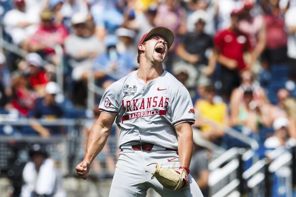 Arkansas pitcher Gage Wood celebrates after striking out the final Murray State batter in the eighth inning of an NCAA College World Series baseball game in Omaha, Neb., Monday, June 16, 2025. (Chris Machian/Omaha World-Herald via AP)