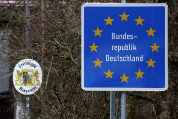 FILE - A German border sign stands at the Austrian-German border in Sachrang, Germany, Thursday, Dec. 10, 2020. Germany says it will temporarily introduce some border controls as the country gets ready to host the Group of Seven summit later this month in the Bavarian Alps. The country’s interior ministry said in a statement Saturday, June 11, 2022 that it will increase border security from June 13-July 3. (AP Photo/Matthias Schrader, File )