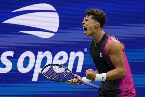 Ben Shelton, of the United States, reacts during a match against Frances Tiafoe, of the United States, during the quarterfinals of the U.S. Open tennis championships, Wednesday, Sept. 6, 2023, in New York. (AP Photo/Charles Krupa)