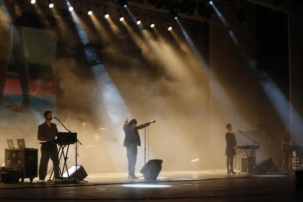 FILE - Members of Slovenian rock band Laibach perform in Pyongyang, North Korea, Wednesday, Aug. 19, 2015. Slovenia's iconic band Laibach will hold a concert in Ukraine's capital next month, saying Wednesday, Feb. 22, 2023, this will make them the first foreign group to perform a full show in Kyiv since the beginning of the Russian invasion last February. (AP Photo/Dita Alangkara, File)