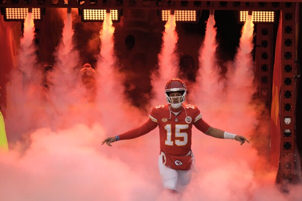Kansas City Chiefs quarterback Patrick Mahomes is introduced before the start of an NFL football game against the Cincinnati Bengals Sunday, Dec. 31, 2023, in Kansas City, Mo. (AP Photo/Charlie Riedel)