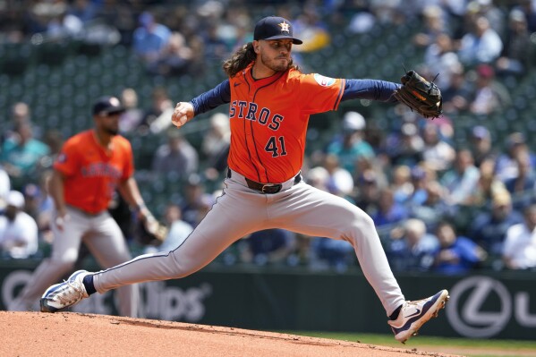 Houston Astros starting pitcher Spencer Arrighetti throws against the Seattle Mariners during the first inning of a baseball game, Thursday, May 30, 2024, in Seattle. (AP Photo/Lindsey Wasson)