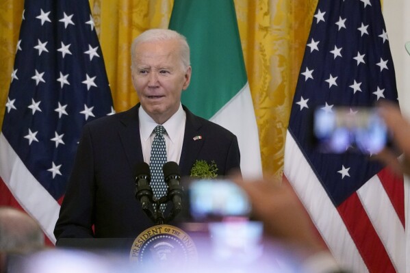 President Joe Biden speaks during a St. Patrick's Day reception in the East Room of the White House, Sunday, March 17, 2024. (AP Photo/Stephanie Scarbrough)