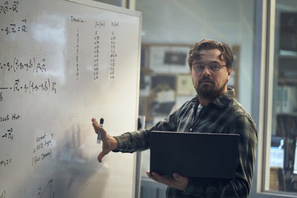 This image released by Netflix shows Leonardo DiCaprio as Dr. Randall Mindy in a scene from "Don't Look Up." (Niko Tavernise/Netflix via AP)