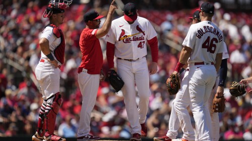 St. Louis Cardinals starting pitcher Jordan Montgomery (47) is removed by manager Oliver Marmol, second from left, during the seventh inning of a baseball game Sunday, July 2, 2023, in St. Louis. (AP Photo/Jeff Roberson)