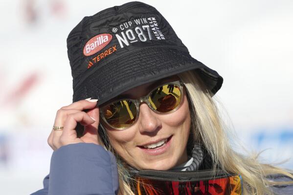 The winner United States' Mikaela Shiffrin wears an hat with n. 87, the number of her World Cup victories, one more than ski great Ingemar Stenmark, after an alpine ski, women's World Cup slalom, in Are, Sweden, Saturday, March 11, 2023. (AP Photo/Alessandro Trovati)