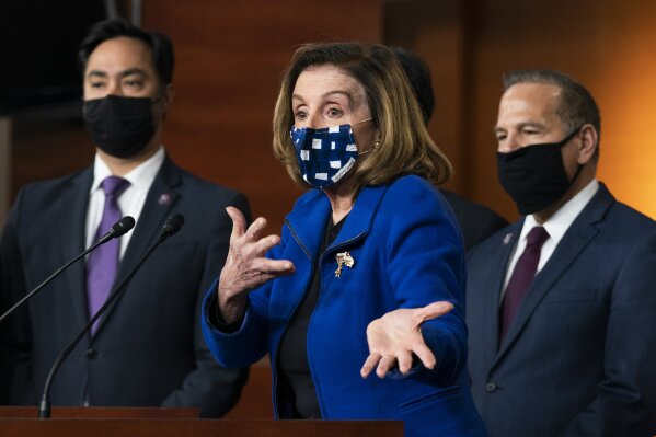 House Speaker Nancy Pelosi of Calif., with impeachment managers Rep. David Cicilline, D-R.I., and Rep. Joaquin Castro, D-Texas, speaks to members of the media during a news conference on Capitol Hill in Washington, after the U.S. Senate voted not guilty, to acquit former President Donald Trump of inciting riot at U.S. Capitol, ending impeachment trial, Saturday, Feb. 13, 2021. (AP Photo/Manuel Balce Ceneta)