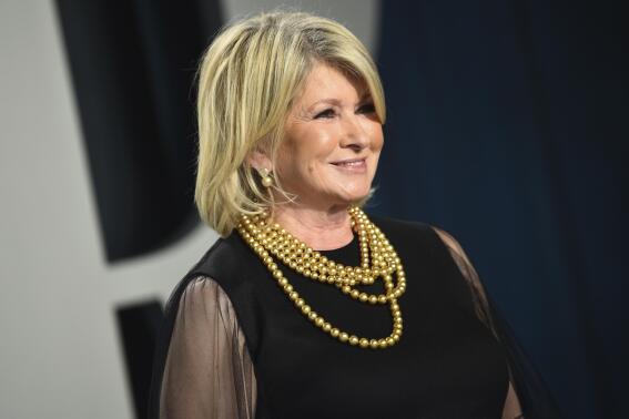 FILE - Martha Stewart arrives at the Vanity Fair Oscar Party, Feb. 9, 2020, in Beverly Hills, Calif. At 81, Stewart isn't slowing down and some might say she's heating up as one of Sports Illustrated's 2023 cover models. In an Instagram post Monday, May 15, 2023, the businesswoman and media personality wrote she hopes the cover inspires people “to try new things, no matter what stage of life you're in.” (Photo by Evan Agostini/Invision/AP, File)