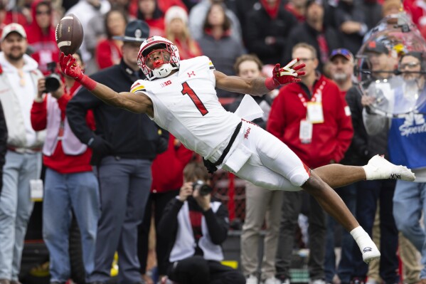 Maryland's Kaden Prather (1) dives for a pass just out of reach against Nebraska during the second half of an NCAA college football game Saturday, Nov. 11, 2023, in Lincoln, Neb. (AP Photo/Rebecca S. Gratz)