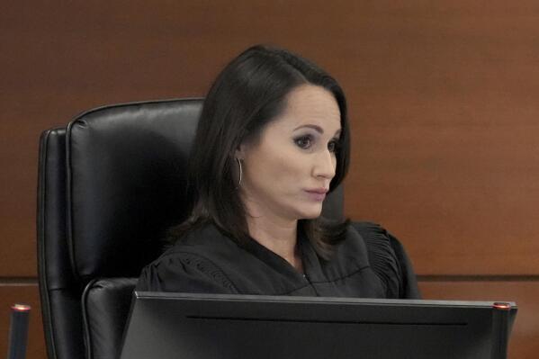 Judge Elizabeth Scherer is shown on the bench during a hearing in the penalty phase of the trial of Marjory Stoneman Douglas High School shooter Nikolas Cruz at the Broward County Courthouse in Fort Lauderdale on Monday, Sept. 19, 2022. The defense filed a motion asking Judge Elizabeth Scherer to recuse herself based on comments she made in court when lead defense attorney Melisa McNeill announced the defense's intention to rest their case last week. The motion was denied. Cruz previously plead guilty to all 17 counts of premeditated murder and 17 counts of attempted murder in the 2018 shootings. (Amy Beth Bennett/South Florida Sun Sentinel via AP, Pool)