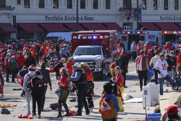 Police clear the area after a shooting at the Kansas City Chiefs' NFL Super Bowl celebration in Kansas City, Missouri, Wednesday, February 14, 2024. Fire officials said multiple people were injured.  (AP Photo/Reed Hoffman)