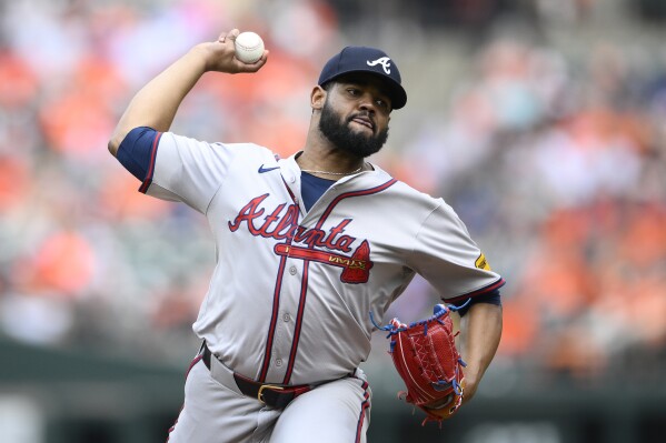 Atlanta Braves starting pitcher Reynaldo Lopez throws during the first inning of a baseball game against the Baltimore Orioles, Thursday, June 13, 2024, in Baltimore. (AP Photo/Nick Wass)