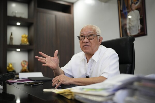 FILE - Batangas Gov. Hermilando Mandanas gestures during an interview with The Associated Press at his office in the city of Batangas, Batangas province, Philippines on Thursday, Aug. 10, 2023. (AP Photo/Aaron Favila, File)