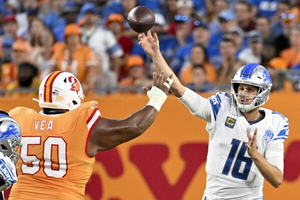 NFC North-leading Lions rally from 12-point deficit late to beat Bears 31-26