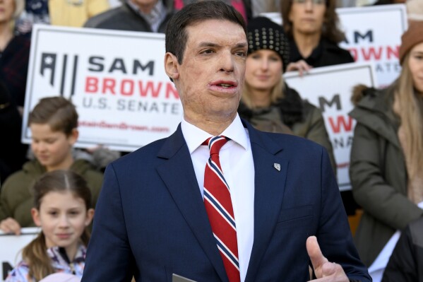 FILE - Republican senatorial candidate Sam Brown speaks after filing his paperwork to run for the Senate, March 14, 2024, at the State Capitol in Carson City, Nev. Brown is seeking to replace incumbent U.S. Sen. Jacky Rosen. (AP Photo/Andy Barron)