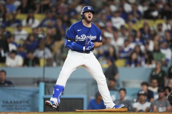Freeman has 3 hits to lead Dodgers to 8-2 victory