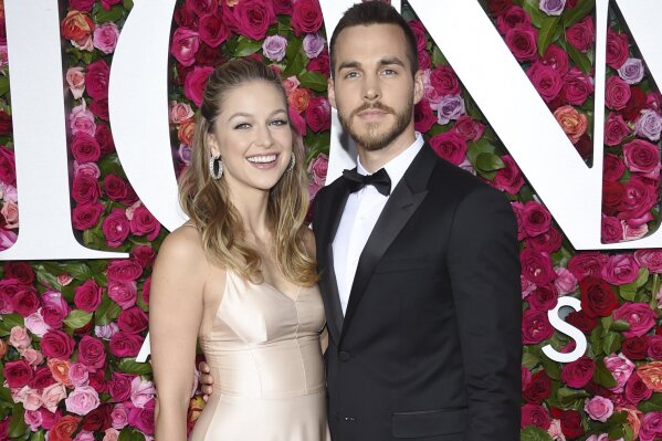 FILE - This June 10, 2018 file photo shows Melissa Benoist, left, and Chris Wood at the 72nd annual Tony Awards in New York. Benoist and Wood will join performers Jane Lynch, Wayne Brady and Laurie Metcalf for a concert being livestreamed Saturday, Sept. 21, 2019, to benefit low-income migrants. The concert is set for 6 p.m. PDT at UCLA’s Royce Hall. It will be broadcast via Facebook Live and at ConcertsforAmerica.com. Proceeds will benefit the National Immigration Law Center. (Photo by Evan Agostini/Invision/AP, File)