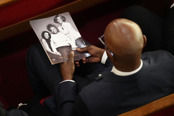 A person attends a ceremony celebrating the life for Cissy Houston on Thursday, Oct. 17, 2024, at the New Hope Baptist Church in Newark, N.J. (Photo by Charles Sykes/Invision/AP)