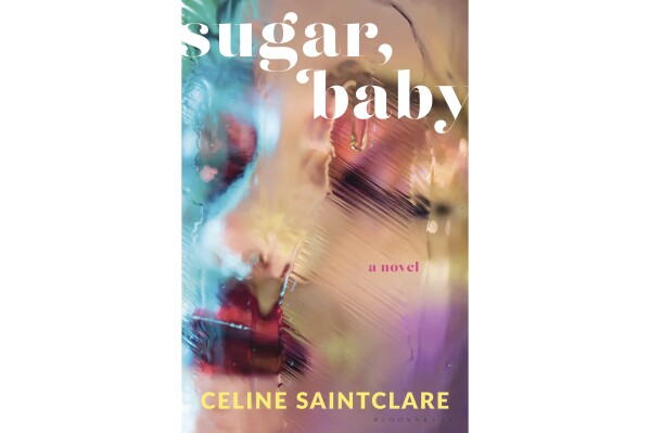 This cover image released by Bloomsbury shows "Sugar, Baby" by Celine Saintclare. (Bloomsbury via AP)