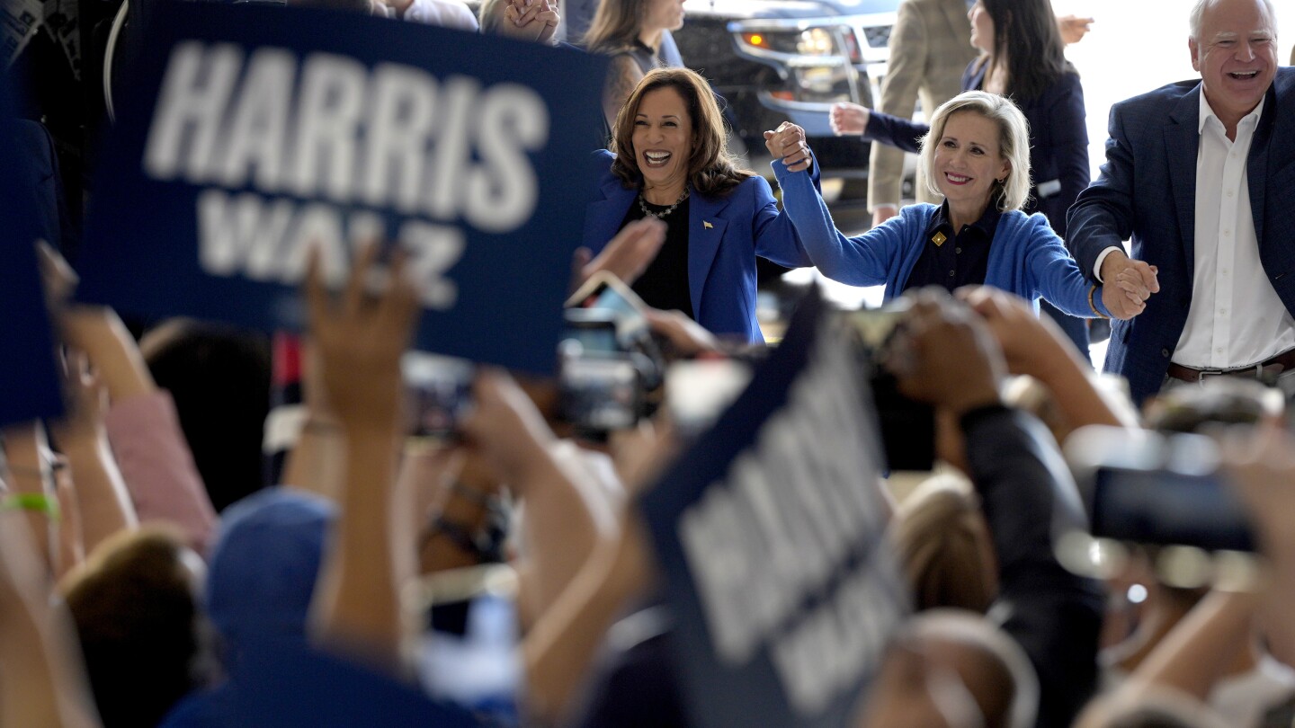 Harris and Walls make phone calls, rally volunteers on Pennsylvania bus tour before DNC in Chicago