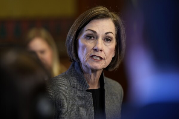 Iowa Gov. Kim Reynolds speaks during a news conference at the Statehouse in Des Moines, Iowa, Jan. 31, 2024. (AP Photo/Charlie Neibergall, File)