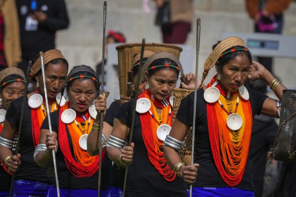 Indigenous Naga tribals dance during the Hornbill Festival in Kisama, on the outskirts of Kohima, capital of the northeastern Indian state of Nagaland, Tuesday, Dec. 10, 2024. (AP Photo/Anupam Nath)