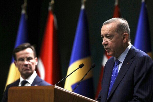FILE - Turkish President Recep Tayyip Erdogan, right, and Sweden's new prime minister, Ulf Kristersson, speak to the media after their talks at the presidential palace in Ankara, Turkey, on Nov. 8, 2022. NATO's much-celebrated unity faces fresh strains when leaders gather for their annual summit this week in Vilnius, Lithuania. Disagreements have been stacking up over admitting Sweden as NATO's 32nd member, boosting military spending and finding a new secretary general. (AP Photo/Burhan Ozbilici, File)