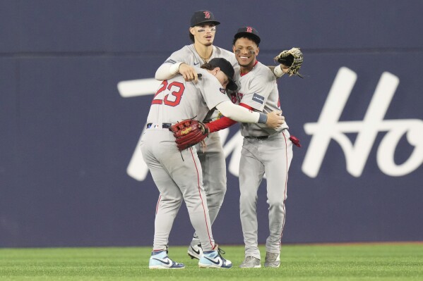Trevor Story hits tiebreaking double in 10th as Red Sox beat Blue Jays 6-5  | AP News