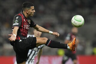 FILE - Nice's Youcef Atal in action during the Conference League Group D soccer match between Nice and Partizan at Allianz Riviera stadium in Nice, France, on Oct. 27, 2022. The Nice public prosecutor’s office has opened a preliminary investigation targeting Nice soccer player Youcef Atal on charges “of praising terrorism and public incitement to hatred or violence.” The prosecutor's office announced the opening of a preliminary investigation in a statement Monday Oct. 16, 2023. (AP Photo/Daniel Cole, File)