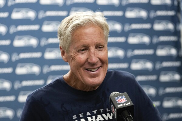Seattle Seahawks head coach Pete Carroll smiles after an NFL football game against the Detroit Lions in Detroit, Sunday, Sept. 17, 2023. (AP Photo/Paul Sancya)